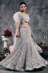 Shop_Vandana Sethi_Silver Net Sequins Halter Neck Fusion Lehenga Set _Online_at_Aza_Fashions