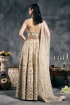 Shop_Vandana Sethi_Ivory Silk Embroidery Halter Neck And Gold Fusion Lehenga Set _Online_at_Aza_Fashions