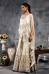 Vandana Sethi_Ivory Silk, Satin Mirrors Round Neck Gold Embroidered Kurta Set _at_Aza_Fashions