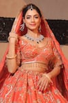 Amaltas Couture_Rust Tissue Sequins, Cut Work, Beads Round Neck Orange Bridal Lehenga Set _Online_at_Aza_Fashions
