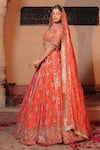Shop_Amaltas Couture_Rust Tissue Sequins, Cut Work, Beads Round Neck Orange Bridal Lehenga Set _at_Aza_Fashions