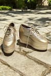 Buy_THE ALTER_Gold Metallic Shimmer Platform Sneakers _at_Aza_Fashions