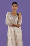 Buy_LABEL RADINI_Ivory Chanderi Zari V-neck Pearl Kurta Set _Online_at_Aza_Fashions