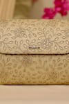 Shop_AMYRA_Gold Embroidery, Cut Work Tarang Flapover Clutch - Light _Online_at_Aza_Fashions
