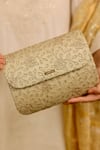 AMYRA_Gold Embroidery, Cut Work Tarang Flapover Clutch - Light _at_Aza_Fashions