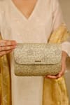 Buy_AMYRA_Gold Embroidery, Cut Work Tarang Flapover Clutch - Light _at_Aza_Fashions