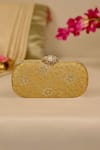 Shop_AMYRA_Mustard Cut Work Tarang Capsule Clutch _at_Aza_Fashions