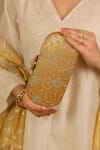 AMYRA_Mustard Cut Work Tarang Capsule Clutch _Online_at_Aza_Fashions