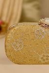 AMYRA_Mustard Cut Work Tarang Capsule Clutch _at_Aza_Fashions