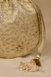 AMYRA_Gold Embroidery, Tassels Tarang Cutwork Potli Bag _at_Aza_Fashions