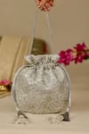 Shop_AMYRA_Silver Embroidery, Tassels Tarang Cutwork Potli Bag _at_Aza_Fashions