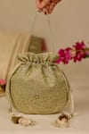 Shop_AMYRA_Green Embroidery, Cut Work Tarang Potli Bag _at_Aza_Fashions