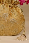 Shop_AMYRA_Mustard Embroidery, Cut Work Tarang Potli Bag _Online_at_Aza_Fashions