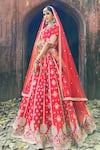 Shop_Amaltas Couture_Red Silk, Net Pearls, Mirrors, Embroidery V-neck Zardozi Bridal Lehenga Set _at_Aza_Fashions