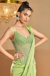 K&A By Karishma and Ashita_Green Net, Satin Beads, Embroidery, Sequins Light Pre-draped Saree And Corset _Online_at_Aza_Fashions