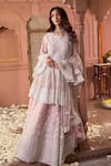 Buy_Tasuvure Indes_Pink Net Sequins, Lace, Embroidery Round Neck Soft Peplum Tunic And Lehenga _at_Aza_Fashions
