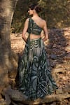 Shop_Nirmooha_Olive Green Silk Tassels Asymmetric Tribal Royal Geometric Printed Lehenga Set _at_Aza_Fashions