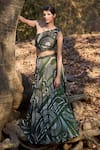 Buy_Nirmooha_Olive Green Silk Tassels Asymmetric Tribal Royal Geometric Printed Lehenga Set _at_Aza_Fashions