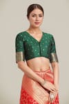 Samyukta Singhania_Red Brocade, Silk Tassels V-neck Banarasi Saree And Blouse Set _Online_at_Aza_Fashions