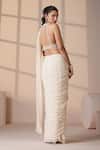 Chaashni by Maansi and Ketan_Ivory Georgette, Net Pearls, Beads, Sequins Halter Designer Pre-draped Saree Set _Online_at_Aza_Fashions