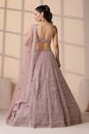 Chaashni by Maansi and Ketan_Pink Net Beads, Sequins, Zari Sweetheart Neck Embroidered Bridal Lehenga Set _Online_at_Aza_Fashions