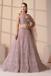 Chaashni by Maansi and Ketan_Pink Net Beads, Sequins, Zari Sweetheart Neck Embroidered Bridal Lehenga Set _at_Aza_Fashions