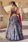 Shop_Label Moni K_Blue Organza Embroidery, Sequins Halter Neck Light Floral Printed Lehenga Set _at_Aza_Fashions
