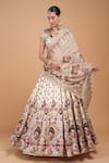Shop_Nirraamyaa_Ivory Silk, Viscose, Satin, Organza Rhinestones, Embroidery Round Lehenga Set _Online_at_Aza_Fashions