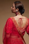 Shop_NIRRAAMYAA_Red Net, Crepe Rhinestones Round Neck Embroidered Lehenga Set _at_Aza_Fashions