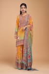 Buy_NIRRAAMYAA_Mustard Brocade, Georgette Rhinestones Round Neck Designer Yellow Kurta Set _at_Aza_Fashions