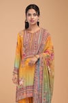 NIRRAAMYAA_Mustard Brocade, Georgette Rhinestones Round Neck Designer Yellow Kurta Set _Online_at_Aza_Fashions