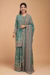 Buy_NIRRAAMYAA_Green Georgette, Viscose Rhinestones Round Neck Bemberg Crepe Kurta Set _at_Aza_Fashions
