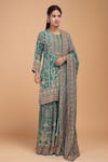 Shop_NIRRAAMYAA_Green Georgette, Viscose Rhinestones Round Neck Bemberg Crepe Kurta Set _Online_at_Aza_Fashions