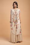 Buy_NIRRAAMYAA_Beige Organza Rhinestones Round Neck Floral Embroidered Kurta Lehenga Set _Online_at_Aza_Fashions