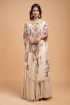 Buy_NIRRAAMYAA_Beige Organza Rhinestones Round Neck Floral Embroidered Kurta Lehenga Set _at_Aza_Fashions