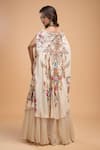 Shop_NIRRAAMYAA_Beige Organza Rhinestones Round Neck Floral Embroidered Kurta Lehenga Set _at_Aza_Fashions