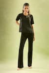 Buy_Samyukta Singhania_Black Neoprene Lycra Embroidery Beaded Ribbon Round Neck Top _at_Aza_Fashions