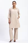 Buy_ABRAHAM AND THAKORE_Beige Chanderi Cut Work Button-down Neck Bird Tunic _at_Aza_Fashions