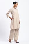 Buy_ABRAHAM AND THAKORE_Beige Chanderi Cut Work Button-down Neck Bird Tunic _Online_at_Aza_Fashions