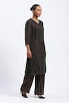 ABRAHAM AND THAKORE_Black Georgette Foil Printing V-neck Gold Beaded Kurta _Online_at_Aza_Fashions