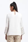 Shop_ABRAHAM AND THAKORE_White Crepe Zari Round Neck Tribal Embroidery Top _at_Aza_Fashions