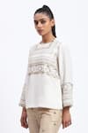 Buy_ABRAHAM AND THAKORE_White Crepe Zari Round Neck Tribal Embroidery Top _Online_at_Aza_Fashions