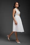 Deepika Arora_White Velvet Vegan Leather Midi Skirt _at_Aza_Fashions