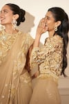 Rimple Agrawal_Gold Georgette, Net Sequins, Embroidery Round Neck Pre-draped Saree Set _at_Aza_Fashions