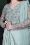 LABEL IVISH_Blue Silk, Net Beads, Sequins V-neck Hand Embroidered Draped Saree Gown _at_Aza_Fashions
