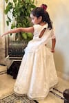 Shop_Rage Attire-Sweta Saria_Off White Chanderi Silk Tassels, Embroidery Flower Organza Cutwork Lehenga Set _at_Aza_Fashions