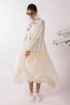 Nikasha_Cream Cotton Embroidery Round Neck Asymmetric Chilly Dress _at_Aza_Fashions