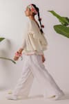 Nikasha_Ivory Cotton Embroidery V-neck Ruffle Top With Ribbon _Online_at_Aza_Fashions