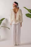 Shop_Nikasha_Ivory Cotton Embroidery V-neck Ruffle Top With Ribbon _at_Aza_Fashions