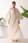 Nikasha_Cream Cotton Round Neck Seersucker Tiered Jacket _at_Aza_Fashions
